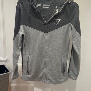 Men’s Gymshark. Hooded top. Zip pockets  logo